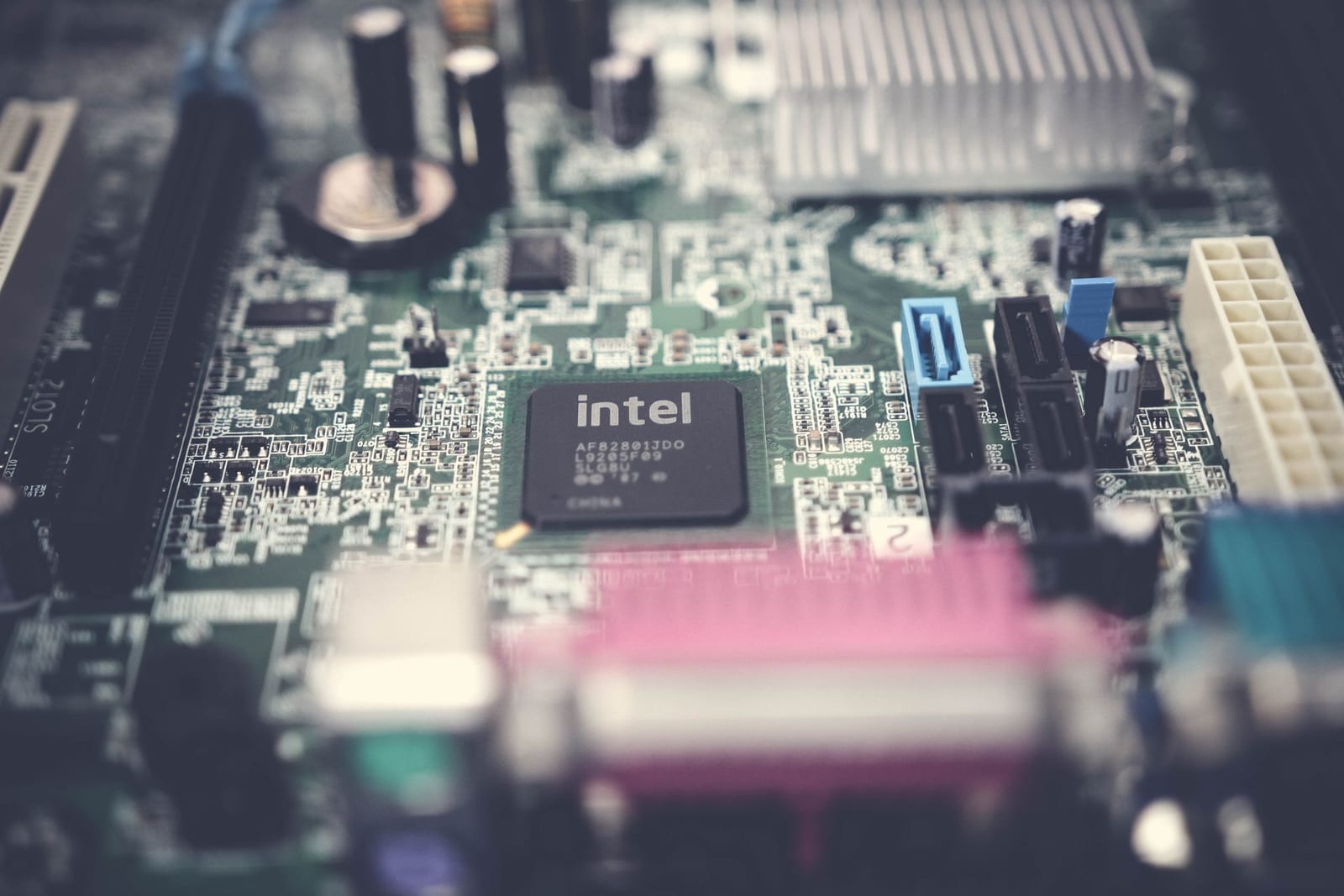 Close-up of a processor chip mounted on a computer motherboard, representing IT equipment imports cleared through PTA type approval